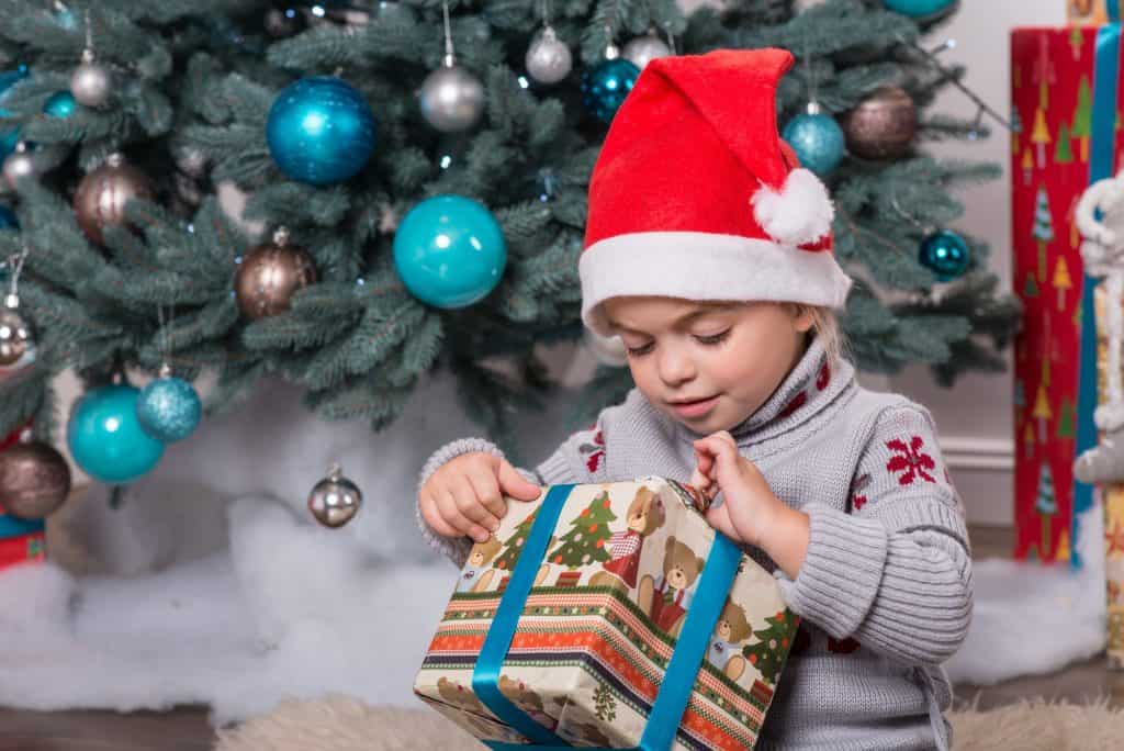 child-opening-present-christmas