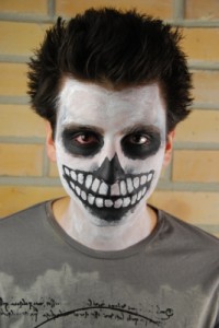Creative types can create a scary skeleton costume using only face paint. Photo by artur84, freedigitalphotos.net.