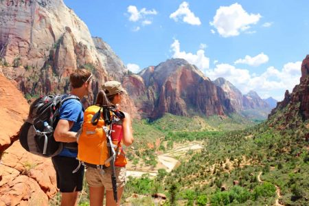 Couple hiking in Zion National Park on a road trip