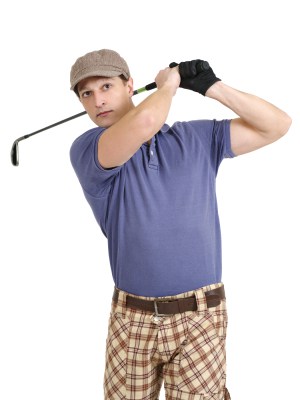Plaid pants and a nine-iron are par for the course for this golf look. Photo by iStock. 
