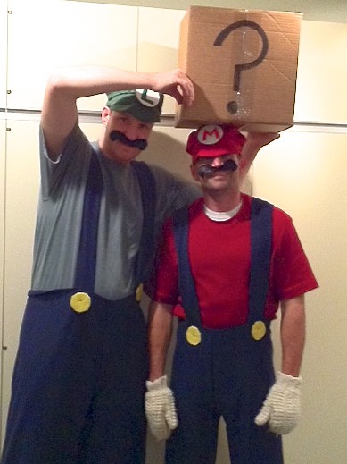 Luigi and Mario from popular video game Super Mario Brothers. What's in the box? 