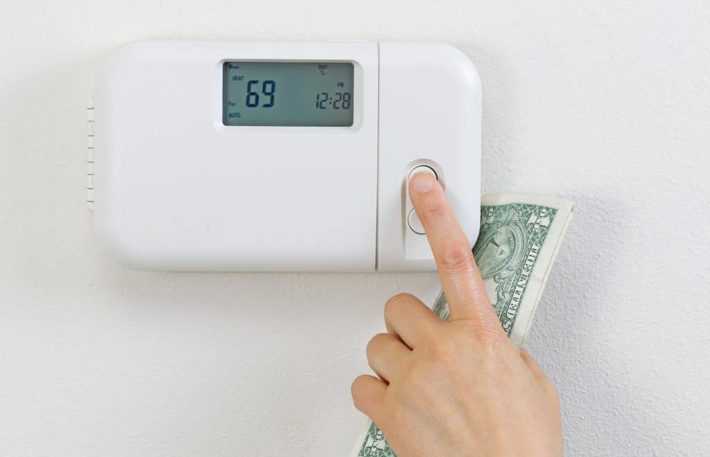 Ahorro de dinero de la calefacción del hogar