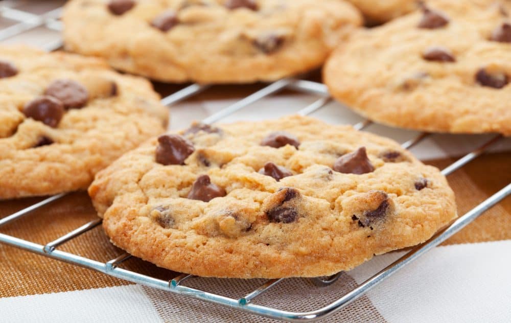 Chocolate Chip Cookies cooling on a rack.