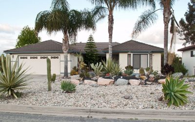House with xeriscape instead of a front lawn in Hidden Meadows, CA photo by Downtowngal licensed under CC