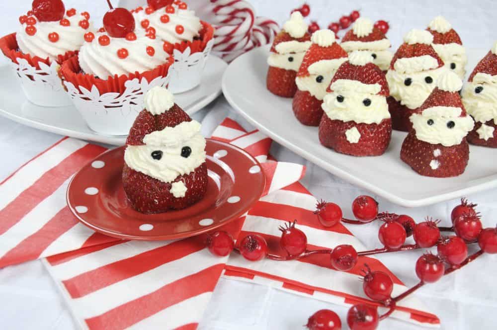 Strawberry santas with red and white cupcakes.