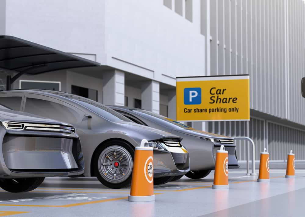 Cars parked in a "car share parking only" space.