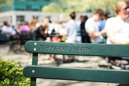 Green park bench at Bryant Park