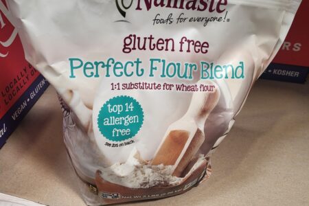 A bag of Namaste gluten-free flour on the shelf at Costco.