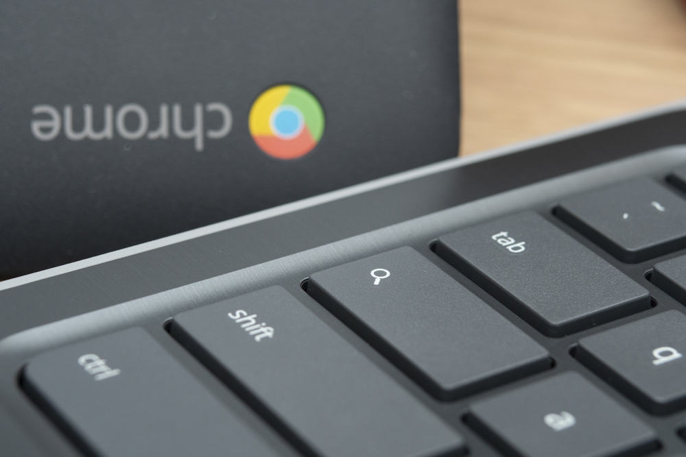 Closeup of Google logo on a Chromebook