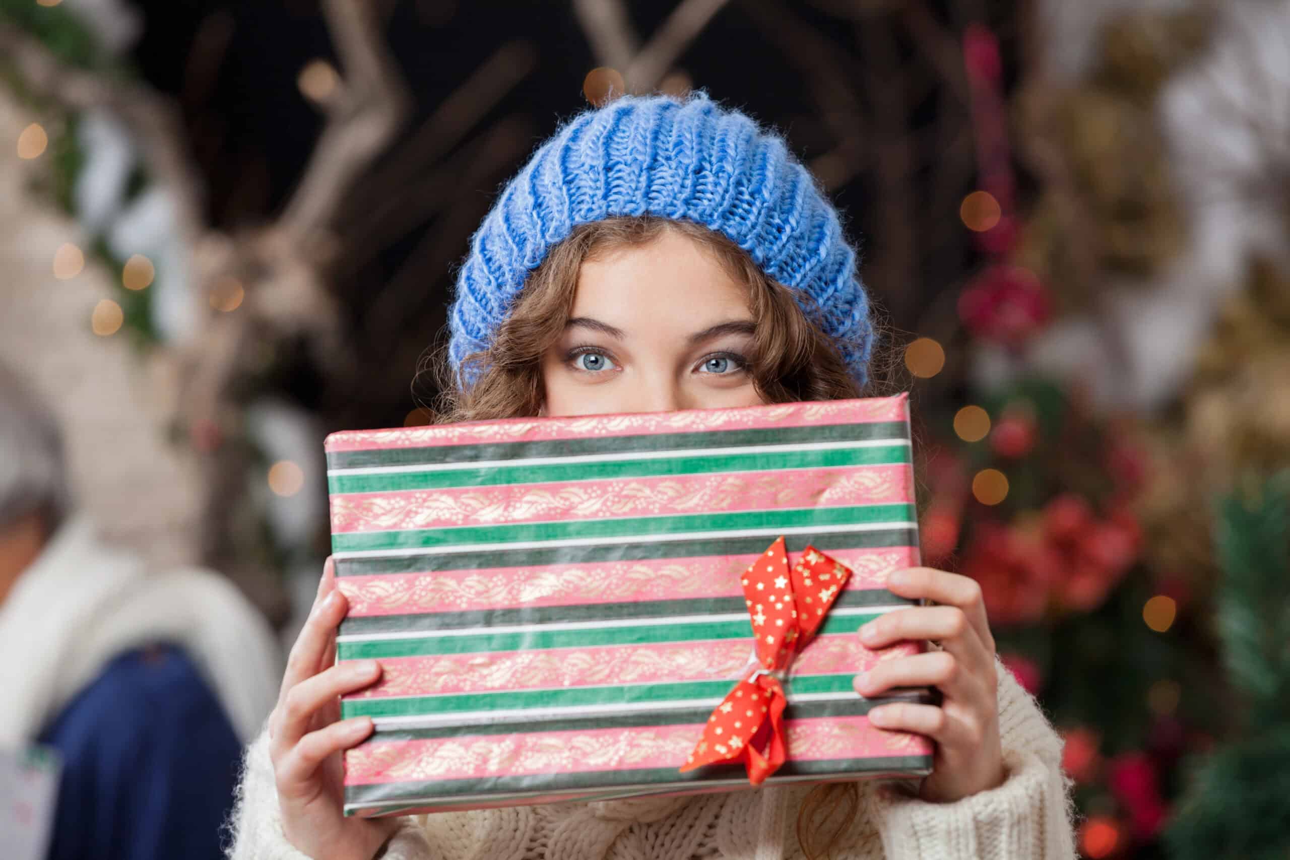 girl holding christmas gift