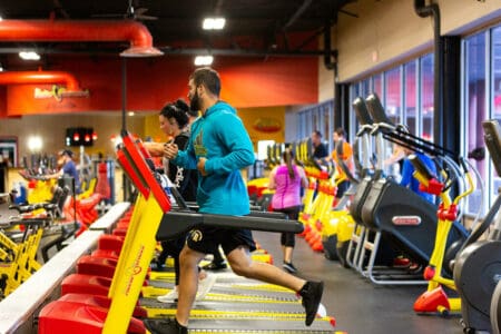 People working out at Retro Fitness gym.