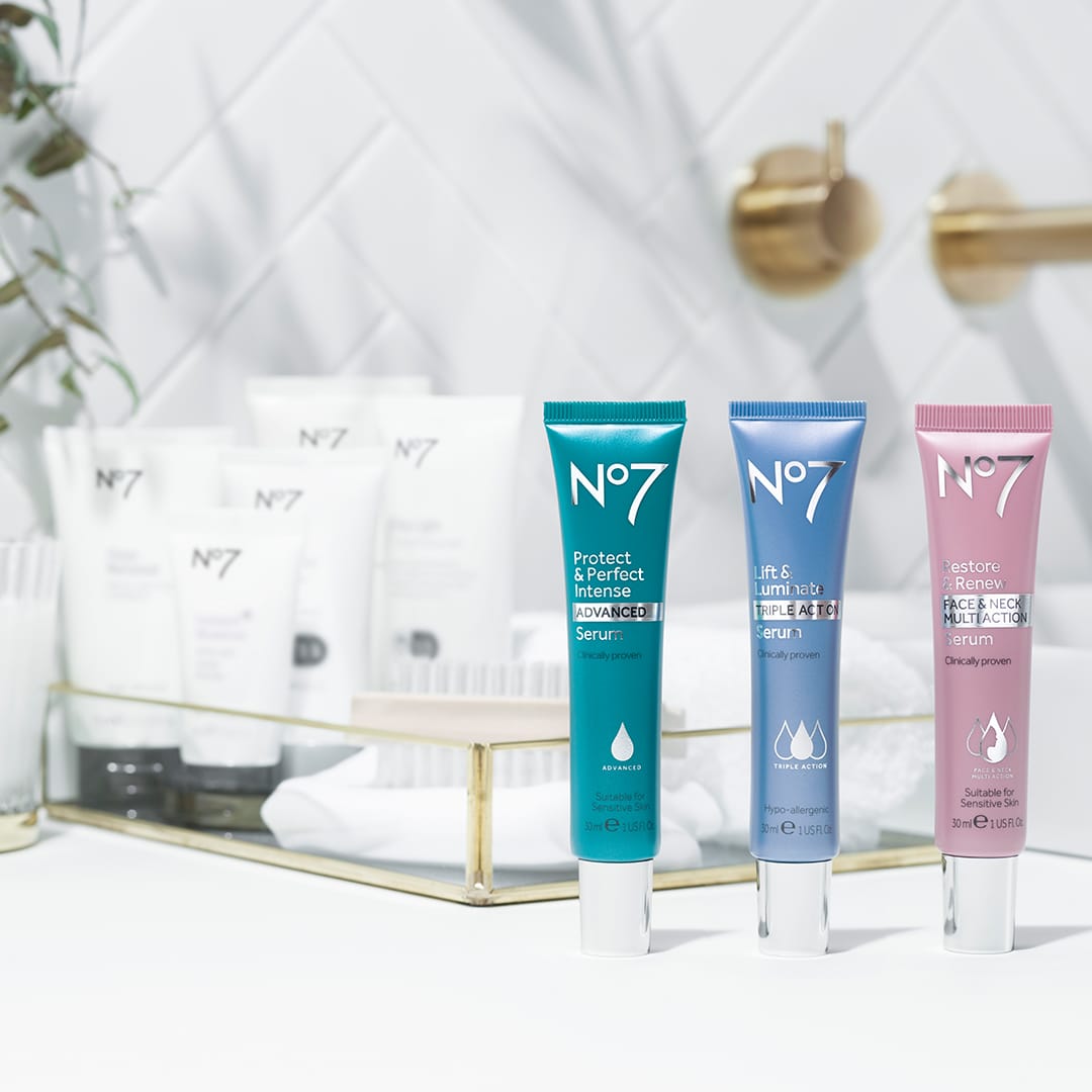 Three tubes of Walgreen's store brand No. 7 serums on a bathroom counter.